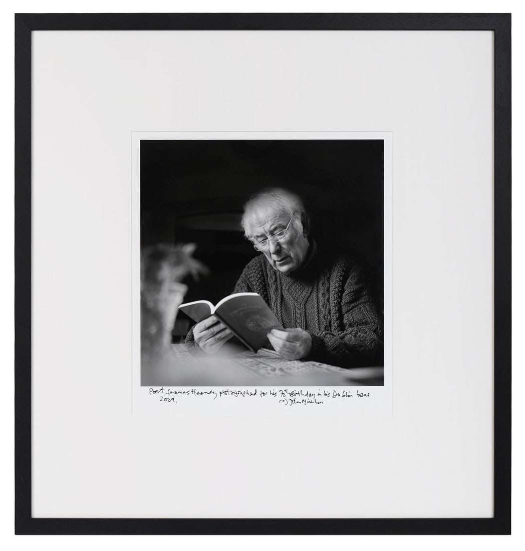 JOHN MINIHAN (B. 1946): Title: Seamus Heaney in his Dublin Home for his 70th Birthday (2009)Medium: Silver Gelatin PrintSignature: Signed Lower Right and TitledProvenance: Private CollectionFramed PICTURES AND PRINTS Wednesd