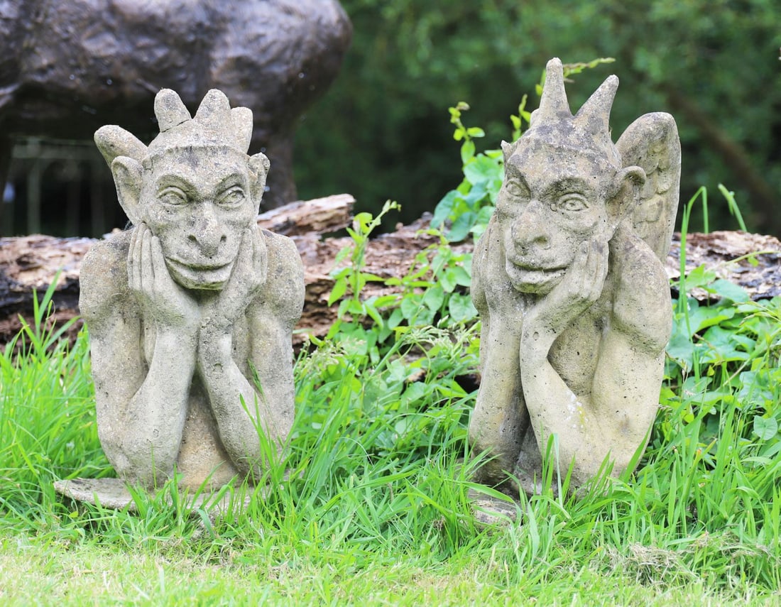 PAIR OF COMPOSITE STONE GARGOYLE FIGURES (1 of 3)