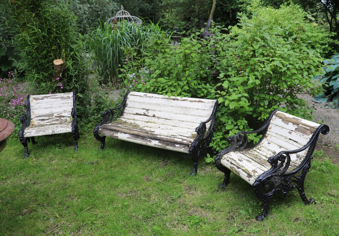 SUITE OF 19TH-CENTURY CAST IRON GARDEN SEATS (1 of 4)