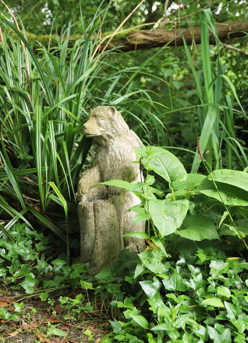 MOULDED STONE FIGURE OF A BEAR (1 of 2)