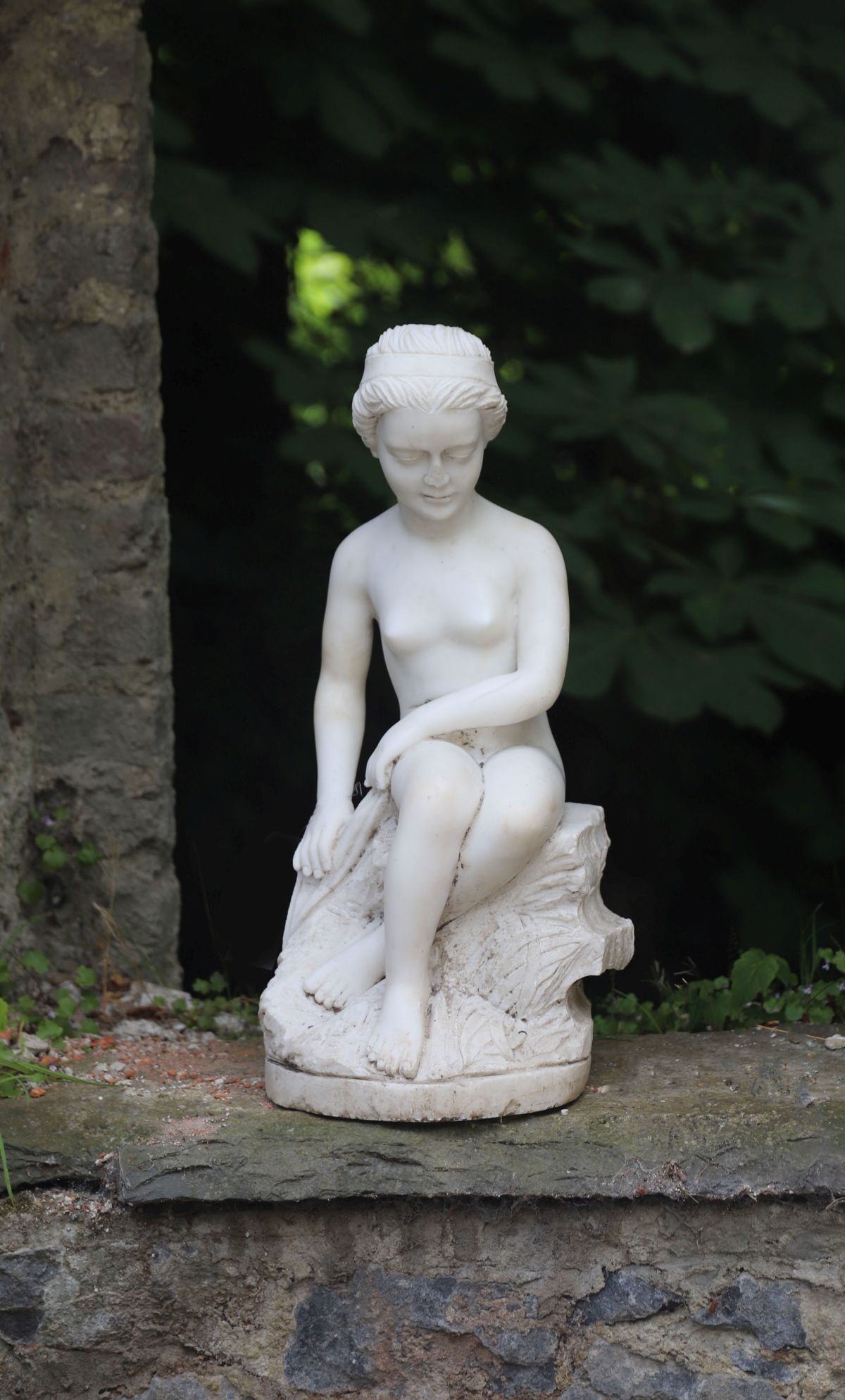 MARBLE SCULPTED GARDEN FIGURE OF A SEATED NYMPH (1 of 2)