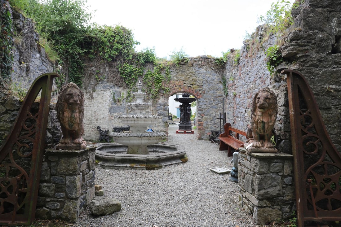 PAIR LARGE TERRACOTTA LIONS (1 of 3)