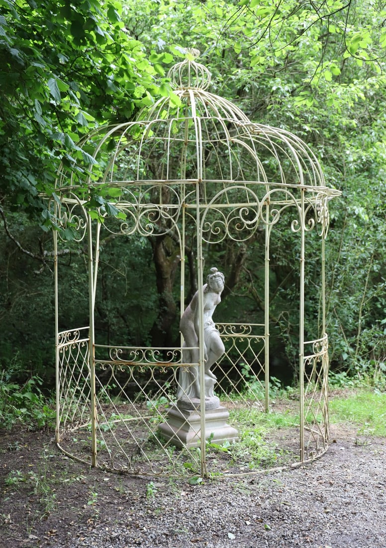 LARGE ORNATE METAL GAZEBO: with domed head above panelled sides.