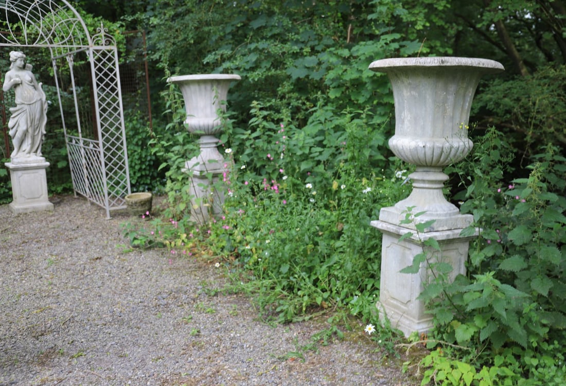 PAIR OF LARGE ITALIANATE STONE URNS (1 of 3)