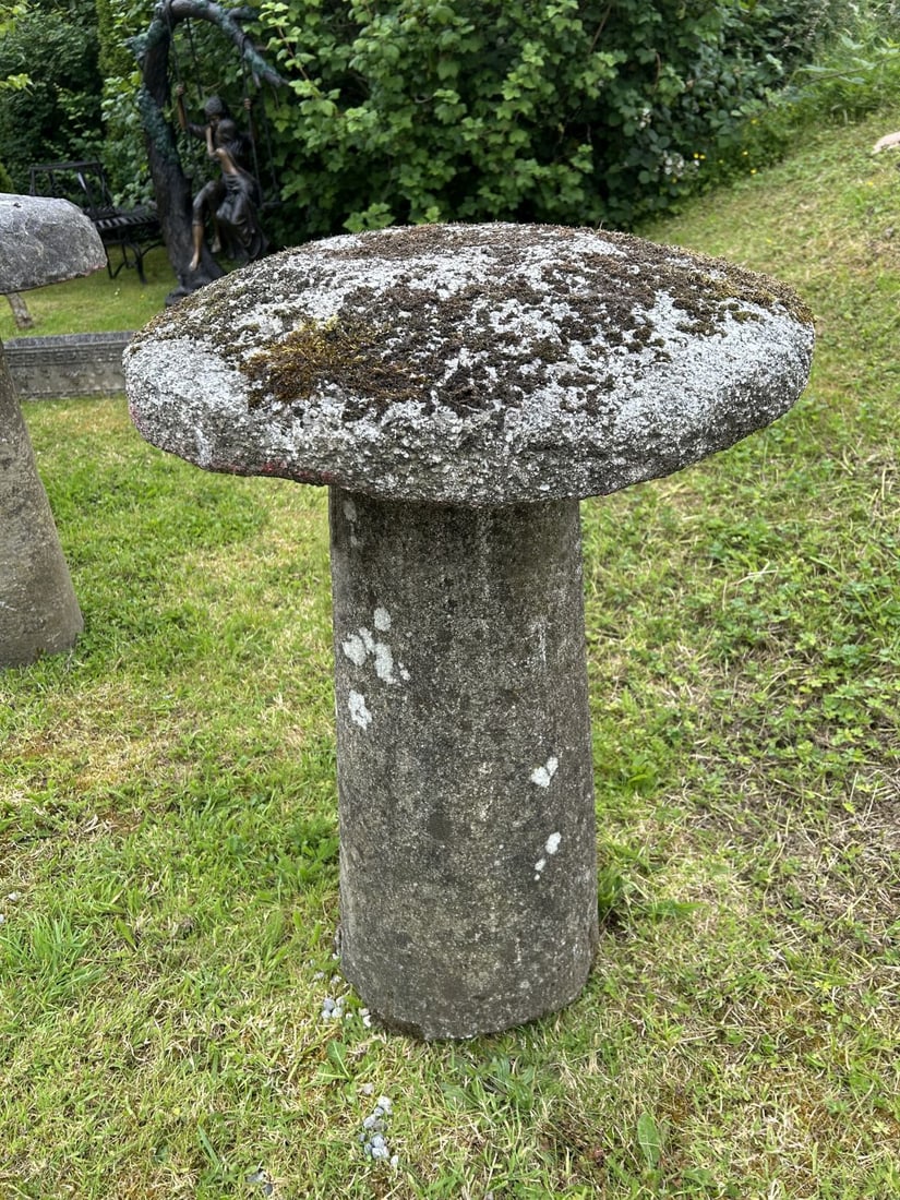 18TH-CENTURY STADDLE STONE: Granite staddle stone with domed cap and weathered surface.