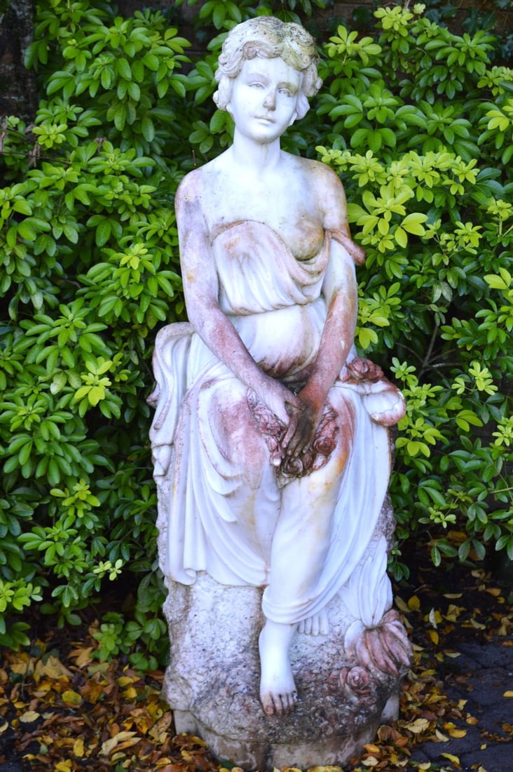 LIFE-SIZE MARBLE SCULPTURE OF SEATED LADY: A finely carved lifesize marble sculpture depicting a seated lady in classical drapery. Elegant posture with serene facial expression, rendered in high-quality white marble.