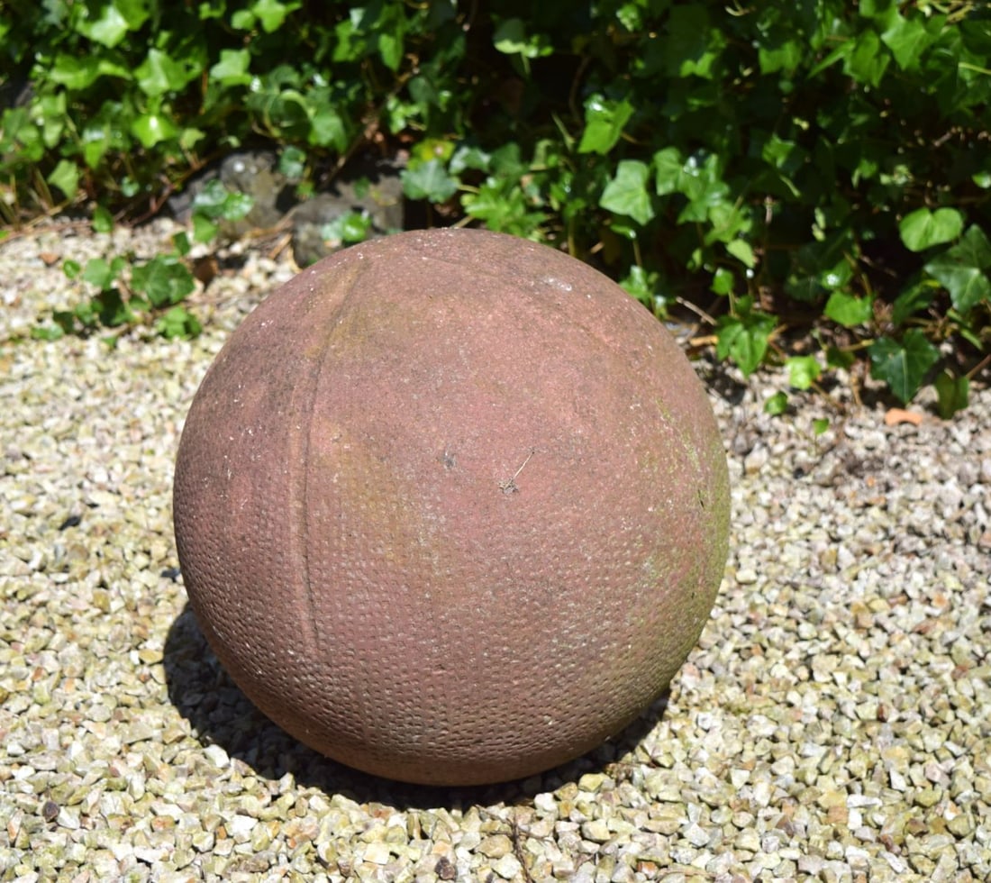 MOULDED STONE SPHER GARDEN MARKER CENTREPIECE: A moulded stone sphere designed as a garden marker or focal centrepiece. Simple form with aged surface and versatile display potential.