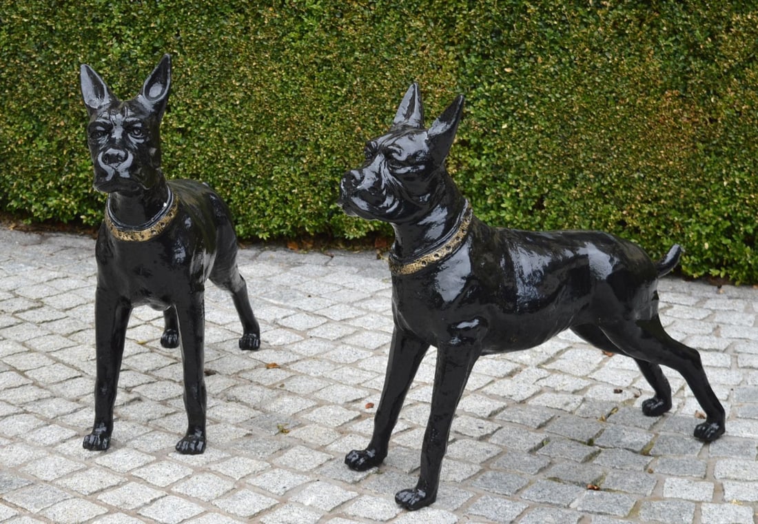 PAIR OF CAST IRON MODELS OF BOXER DOGS (1 of 2)