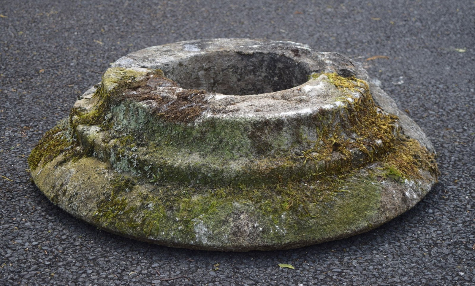 GRANITE CIRCULAR BASE / SURROUND: A circular base or edging surround in solid granite, suitable for garden feature or structural use.