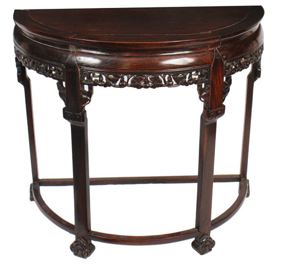 Pair of nineteenth-century Chinese hard wood demi-lune : Pair of nineteenth-century Chinese hard wood demi-lune shaped console tables each with a shaped scroll decorated and frieze, raised on square panelled legs Each 82 cm. wide