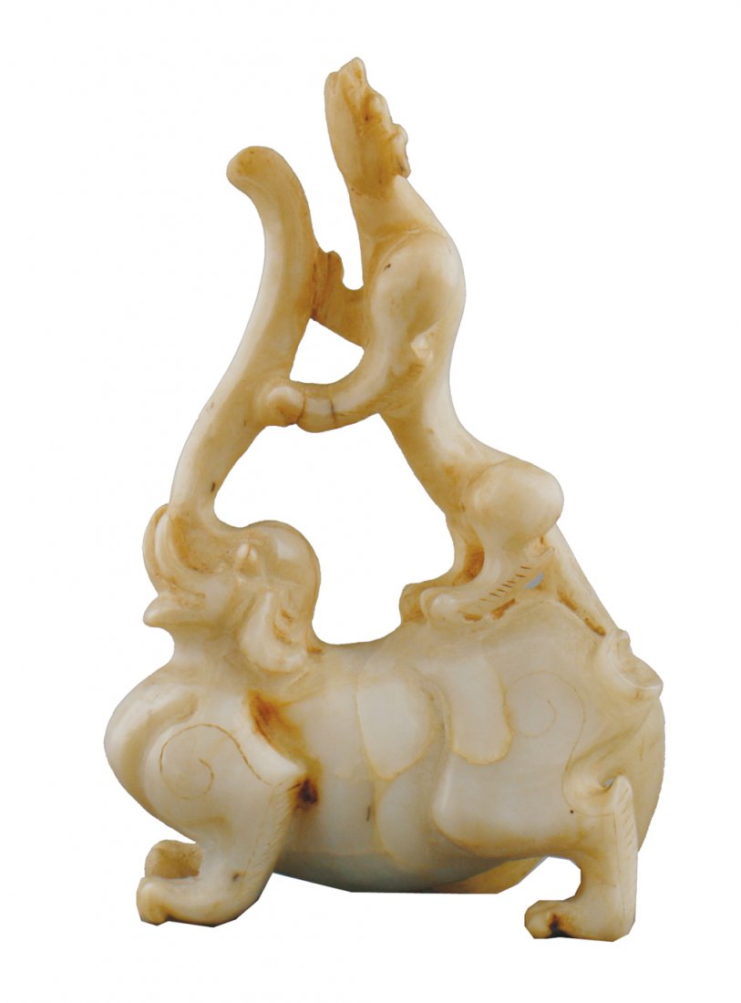 Chinese Ming period white jade elephant with a bear on: Chinese Ming period white jade elephant with a bear on its back 13 cm. high