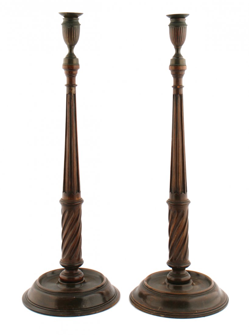 Pair of large Georgian mahogany candlesticks: Pair of large Georgian mahogany candlesticks each with a brass bowl 58 cm. high