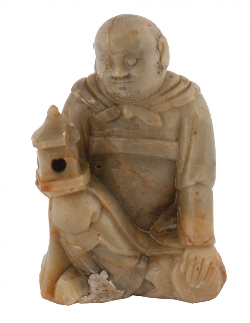 Soapstone carving of a man with lantern: Soapstone carving of a man with lantern 10 cm. high
