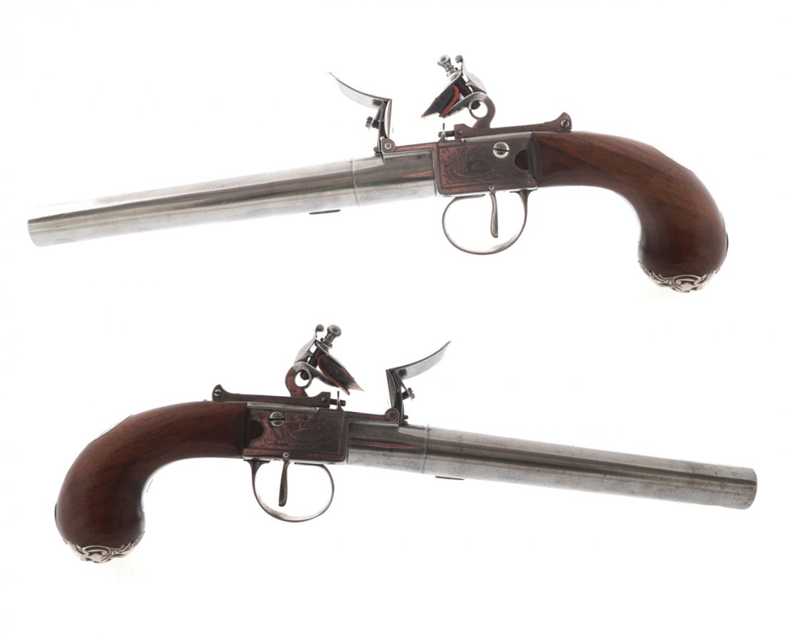 Rare pair of flintlock boxlock pistols: Rare pair of flintlock boxlock pistols by Charles Moore, London, circa 1760. The barrells are rifled with the powder pan gold and silver furniture, silver mark of Michael Barnett, London Worldwide shi