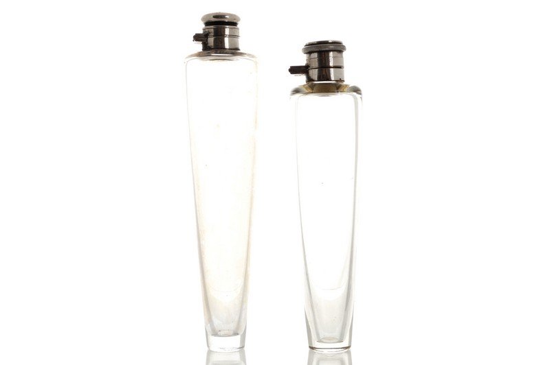 Two nineteenth-century silver topped hunting flasks: Two nineteenth-century silver topped hunting flasks Worldwide shipping available: shipping@sheppards.ie Dimensions: 22 cm. high and lower