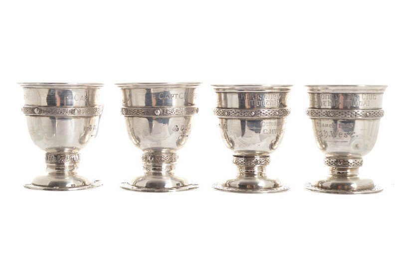 Set of four silver miniature golf trophies (1 of 1)