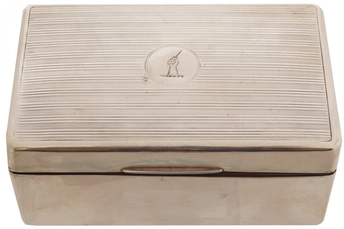 Silver cigarette box: Birmingham, 1924 Worldwide shipping available. All queries must be made to shipping@sheppards.ie prior to 29 February 2016.