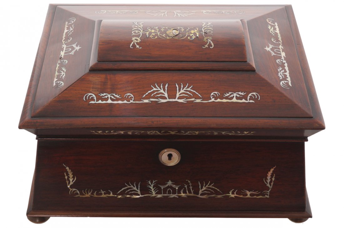 Nineteenth-century rosewood and mother o’ pearl inlaid: of sarcophagus form Worldwide shipping available. All queries must be made to shipping@sheppards.ie prior to 29 February 2016.