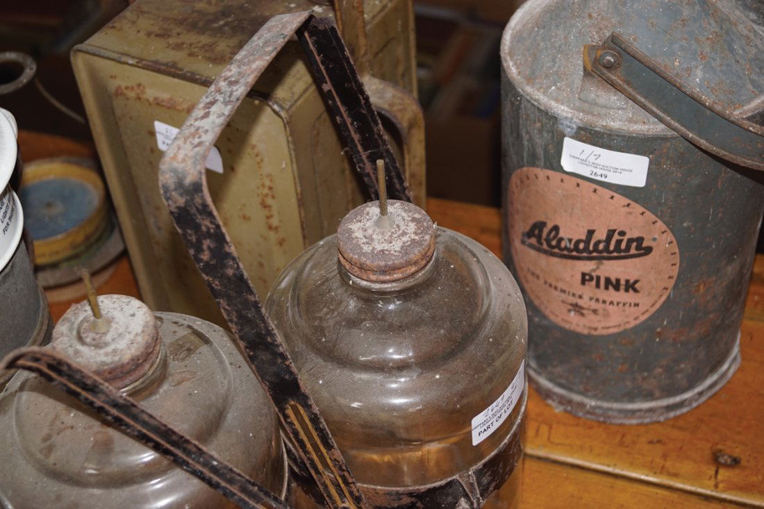 TWO OLD PARAFFIN CANS: Three old glass paraffin jars, Sam Clarke's patent food warmer and a chrome tilly lamp