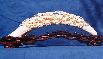 HAND CARVED FAIRY AND ANIMAL VILLAGE TUSK: HAND CARVED FAIRY AND ANIMAL VILLAGE TUSK - EXCELLENT DETAIL - MINT CONDITION - BEAUTIFUL ROSEWOOD BASE - L: 12". W: 4", H: 6".