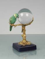 CRYSTAL BALL WITH BIRD ON BRASS STAND WITH PORCELA: BLUE PORCELAIN BASE - INTEICATELY CARVED HEAVY BRASS BRANCH STAND SUPPORTING A 24% ITALIAN LEAD CRYSTAL BALL AND A BEAUTIFULLY HAND PAINTED BIRD - CRYSTAL BALL CAN BE REMOVED FOR A DIFFERENT LOOK - 10