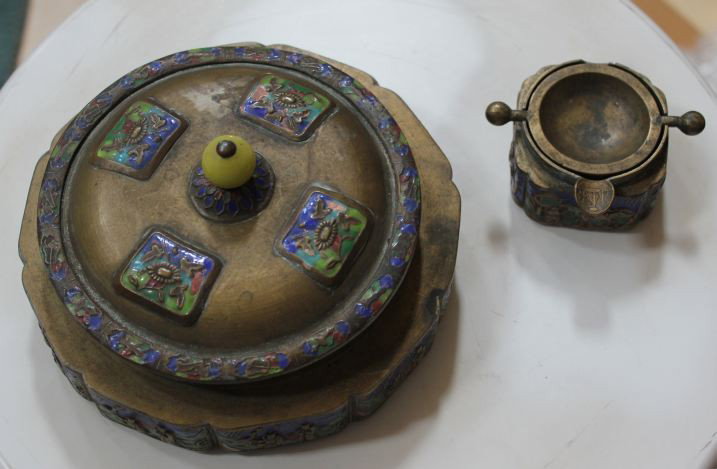 ANTIQUE CHINESE BRASS BOX W/ ASHTRAY - 1900c: ANTIQUE (circa 1900) CHINESE BRASS BOX WITH ASHTRAY - INTRCATELY HAND PAINTED RELIEF PANELS ON ALL SIDES AND LID OF BOX AND ALL SIDES OF ASHTRAY - BOX = 7" DIAMETER - ASHTRAY = 2.5"DIAMETER