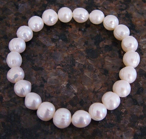 WHITE PEARL BRACELET: WHITE PEARL BRACELET - 8 MM FRESH WATER PEARLS - 7" STRETCH BRACELET