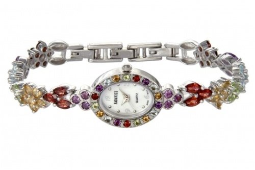 BADAVICI MULTI-GEMSTONE BRACELET WATCH: WOMEN'S BADAVICI MULTI-GEMSTONE BRACELET WATCH - SILVER-TONE PLATINUM RHODIUM PLATING FINISH - STAINLESS STEEL CASE-BACK - MOTHER OF PEARL DIAL WITH SILVER TONE NUMBERS AT THE 3, 6, 9 AND 12 POSITIONS