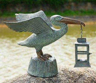 PELICAN LANTERN CANDLE HOLDER: PELICAN LANTERN CANDLE HOLDER - 14.5"H 15"W 7.5"D - CAST IRON, GLASS & ALUMINUM