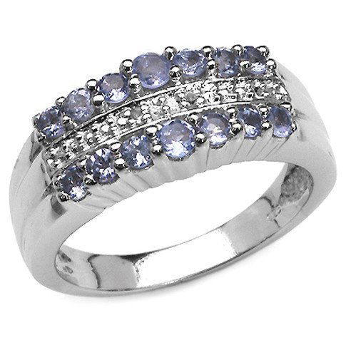 0.55 CARAT GENUINE TANZANITE & WHITE DIAMOND .9: 0.55 CARAT GENUINE TANZANITE & WHITE DIAMOND .925 STERLING SILVER RING - METAL INFORMATION: .925 STERLING SILVER FINISH: HIGH SILVER POLISH ITEM: RING TOTAL CTW: 0.55CTW WEIGHT: 4.09GMS STONE INFORMAT