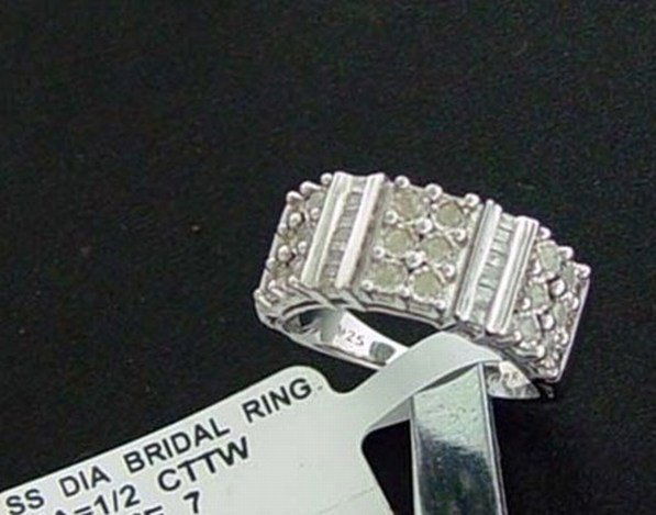 1/2 CTW. DIAMOND RING - PLATINUM OVER STERLING: 1/2 CTW. DIAMOND MULTI-CHANNEL SET BAND RING IN .925 SOLID STERLING SILVER - SIZE 7