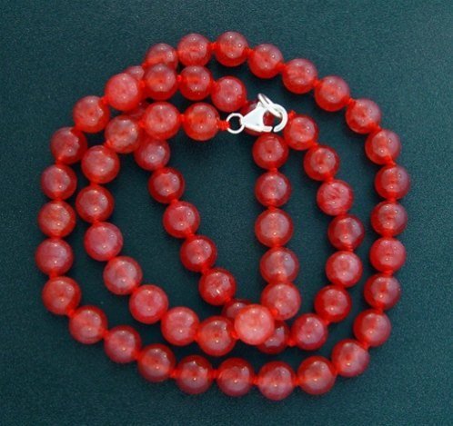 RUBY RED JADE NECKLACE - STERL. CLASP: RUBY RED GENUINE JADE BEADED NECKLACE W/ STERLING SILVER CLASP - BEAD SIZE: 8.5 MM (DIA) - LENGTH: 20" LONG