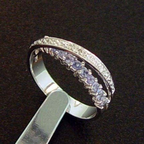 TANZANITE & DIAMOND STERLING RING: GENUINE TANZANITE STERLING SILVER RING - 11 FACETED ROUND CUT GENUINE TANZANITE STONES WITH GENUINE DIAMOND ACCENT POINTS - METAL STAMP: .925 - NO TARNISH RHODIUM PLATINUM FINISH