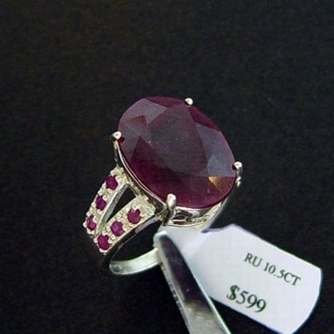 10.5 CT. RUBY & DIAMOND RING - STERLING: LARGE 10.5 CT. GENUINE RUBY AND DIAMOND RING IN STERLING SILVER - FACETED OVAL CUT CENTER RUBY WITH RUBY & DIAMOND ACCENT GEMS - METAL STAMP: .925 - NO TARNISH RHODIUM PLATINUM FINISH