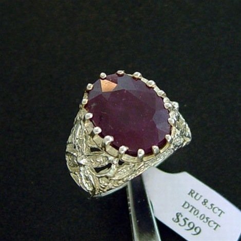 8.5 CT. RUBY & DIAMOND RING - STERLING: LARGE 8.5 CT. GENUINE RUBY AND DIAMOND RING IN STERLING SILVER - FACETED OVAL CUT RUBY WITH GENUINE NATURAL DIAMOND ACCENT STONES - METAL STAMP: .925 - NO TARNISH RHODIUM PLATINUM FINISH