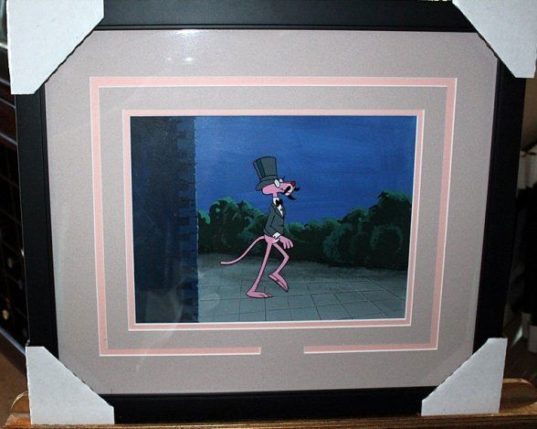 FRIZ FREELING HAND PAINTED ANIMATION CELL: ISADORE "FRIZ" FRELENG (1906-1995) HAND PAINTED ANIMATION CELL ALSO WITH HAND PAINTED BACKGROUND - "TOP HAT PINK PANTHER" - PROFESSIONALLY FRAMED AND MATTED - IMAGE APPX. 9" X 11.5" - FRAMED APPX. 18"