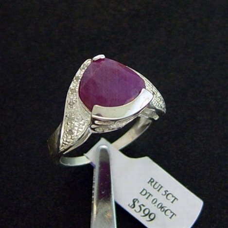 5 CT. RUBY & DIAMOND RING - STERLING: LARGE 5 CT. GENUINE RUBY AND DIAMOND RING IN STERLING SILVER - FACETED TRILLION CUT CENTER RUBY WITH DIAMOND ACCENT GEMS - METAL STAMP: .925 - NO TARNISH RHODIUM PLATINUM FINISH