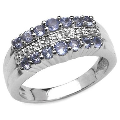 0.55 CARAT GENUINE TANZANITE & WHITE DIAMOND .925: 0.55 CARAT GENUINE TANZANITE & WHITE DIAMOND .925 STERLING SILVER RING - METAL INFORMATION: .925 STERLING SILVER FINISH: HIGH SILVER POLISH ITEM: RING TOTAL CTW: 0.55CTW WEIGHT: 4.09GMS STONE INFORMAT