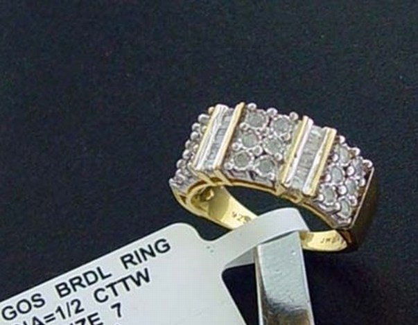 1/2 CTW. DIAMOND RING IN GOLD OVER STERLING: 1/2 CTW. FACETED BAGUETTE AND ROUND CUT DIAMOND RING IN YELLOW GOLD OVER STERLING - MULTI-CHANNEL SET BAND - METAL STAMP: .925