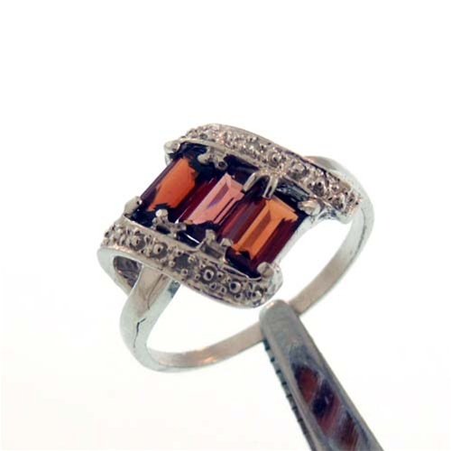 1CT GARNET AND DIAMOND STERLING RING: 1CT GARNET AND DIAMOND STERLING RING. FACETED EMERALD CUT GARNET AND ROUND CUT DIAMONDS.