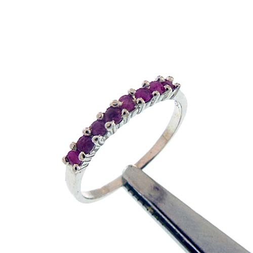 0.41CT RUBY STERLING SILVER RING: 0.41CT RUBY STERLING SILVER RING. FACETED ROUND CUT RUBY.