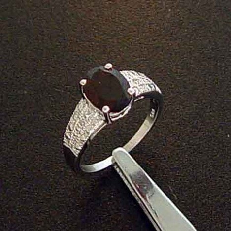 GARNET & DIAMOND STERLING RING: 2.46 CTW. GENUINE GARNET AND DIAMOND STERLING SILVER RING - FACETED OVAL CUT RED GARNET CENTER STONE WITH GENUINE NATURAL DIAMOND ACCENT POINTS - METAL STAMP: .925 - NO TARNISH RHODIUM PLATINUM FINISH