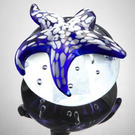 ART GLASS STARFISH PAPERWEIGHT: ART GLASS BLUE STARFISH PAPERWEIGHT - HAND CRAFTED - EACH PIECE IS MADE BY HAND THEREFOR THERE MAY BE SLIGHT VARIATIONS WITHIN EACH INDIVIDUAL PIECE 3"H X 4.5"DIAMETER