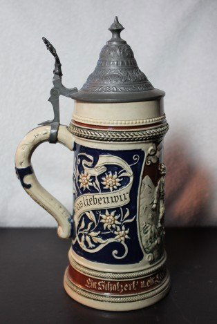 ANTIQUE GERMAN BEER STEIN: ANTIQUE GERMAN BEER STEIN - COBALT BLUE, TAN & BROWN - MADE IN GERMANY PRIOR TO WWII - "GERMANY" STAMPED ON BOTTOM - 10"H X 4"DIA