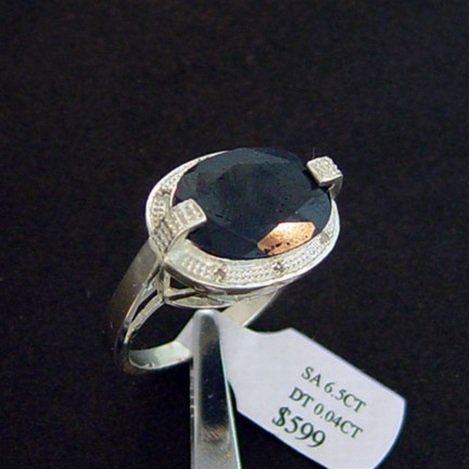 6.5 CT. SAPPHIRE & DIAMOND RING - STERLING: LARGE 6.5 CT. GENUINE SAPPHIRE AND DIAMOND RING IN STERLING SILVER - - FACETED OVAL CUT SAPPHIRE WITH DIAMOND ACCENT GEMS - METAL STAMP: .925 - FINISH: NO TARNISH RHODIUM