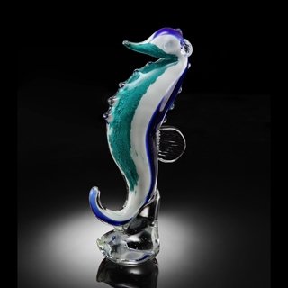 BLUE ART GLASS SEAHORSE: BLUE ART GLASS SEAHORSE - 11.5"H x 5"W x 3"D - HAND CRAFTED - EACH PIECE IS MADE BY HAND THEREFOR THERE MAY BE SLIGHT VARIATIONS WITHIN EACH INDIVIDUAL PIECE