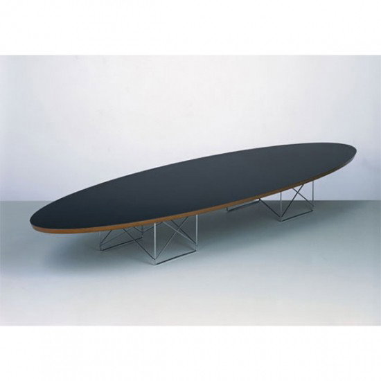 CHARLES AND RAY EAMES ELLIPTICAL SURFBOARD TABLE: Charles and Ray Eames ETR (Surfboard) table, by Herman Miller, 1950s, original black laminated elliptical plywood top on two zinc wire strut bases, signed with round/oval metal tag, original finish, 8