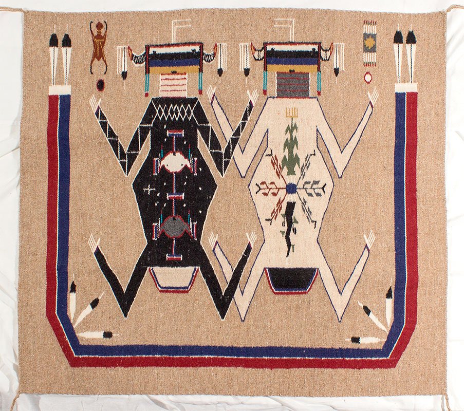 Mother Earth, Father Sky Sandpainting Navajo Rug -: A borderless wool weaving showing two figures, surrounded by the rainbow goddess, measuring 36 x 39.â€ Weaver: Rosita (or Rosicita) Tsosie of Many Farms, NM. She wrote a handwritten explanation of 