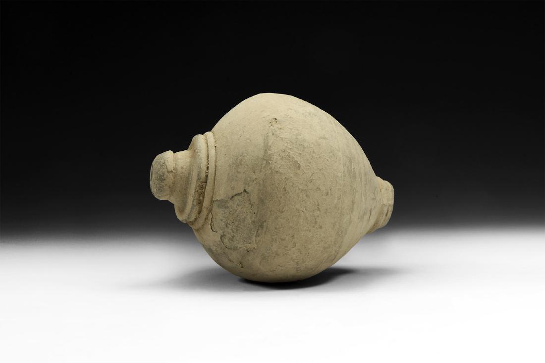 Byzantine 'Greek Fire' Hand Grenade: 10th century AD. A hollow-formed piriform ceramic vessel with low rim to the mouth, incised tiers to the shoulder. See Arendt W.Irene Granaten des 13-14. Jahrhunderts, die an der Wolga gefunden sind,