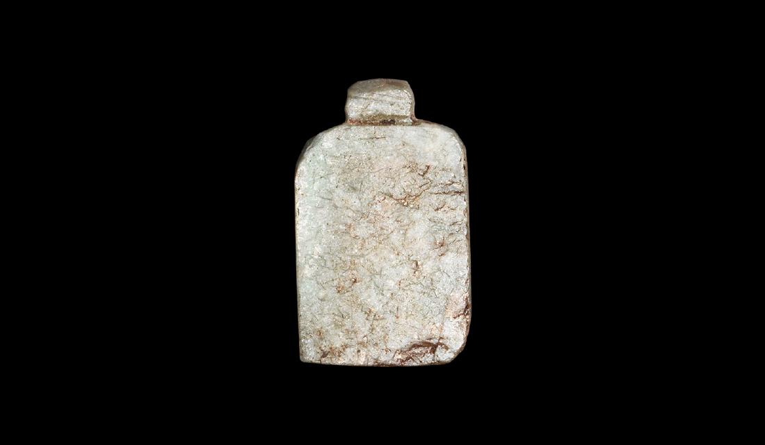 Egyptian Menkhet Amulet: Late Period, 664-332 BC. A feldspar menkhet amulet, pierced for suspension. See Andrews, C. Amulets of Ancient Egypt, London, 1994, p.96.2.64 grams, 22mm (1"). From an early 20th century collection.